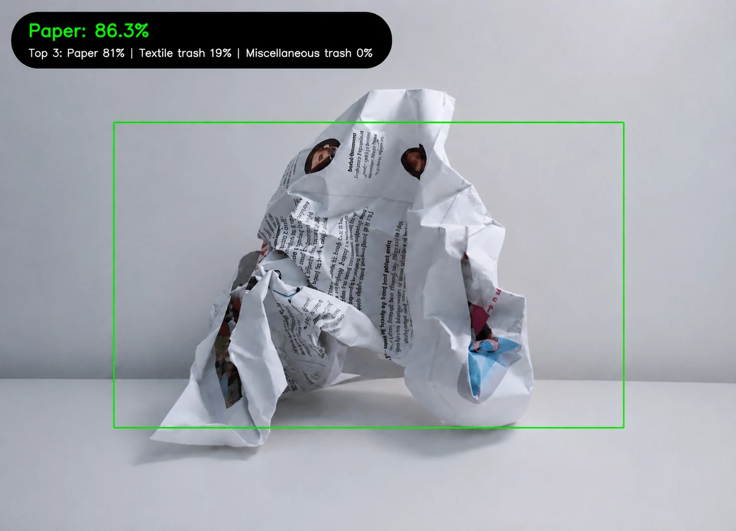 Live waste classifier identifying crumpled paper with 86.3 percent confidence